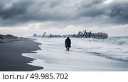 Solitude Concept: A lonely figure walking on a desolate beach, with a broken fence and turbulent sea under a stormy sky, evoking melancholy. Стоковое AI-изображение, AI-художник Данила Большаков / Фотобанк Лори