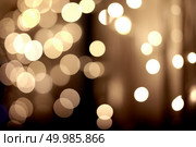 festive christmas yellow light, background bokeh. festive golden bokeh background. Стоковое фото, агентство Ingram Publishing / Фотобанк Лори