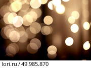 Holiday background. Festive abstract background with bokeh defocused lights. festive golden bokeh background. Стоковое фото, агентство Ingram Publishing / Фотобанк Лори
