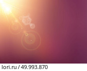 Sun shining with flare on blurred dark purple nature background with sunlight. Vector illustration. Стоковая иллюстрация, агентство Ingram Publishing / Фотобанк Лори