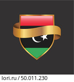 Libya flag Golden badge design vector. Стоковая иллюстрация, агентство Ingram Publishing / Фотобанк Лори