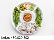 Fresh Oyster serve with assorted vegetable on white background. Стоковое фото, агентство Ingram Publishing / Фотобанк Лори