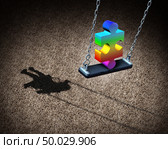 Childhood autism developmental disorder puzzle as a children symbol or an autistic child awareness icon as a jigsaw piece in a playground park on a swing with 3D illustration elements. Стоковое фото, агентство Ingram Publishing / Фотобанк Лори