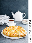 Pie with salted soft cheese and greens. Стоковое фото, агентство Ingram Publishing / Фотобанк Лори