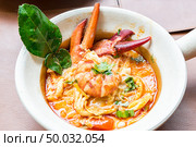 Lobster Tom yum spicy rice noodles. Стоковое фото, агентство Ingram Publishing / Фотобанк Лори