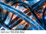 Aerial view of road in the modern city at night in winter. Top view of traffic in highway junction with city illumination. Cars on elevated road. Interchange overpass. Busy intersection. Expressway . Стоковое фото, агентство Ingram Publishing / Фотобанк Лори