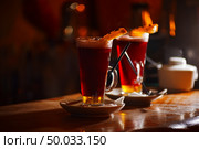 hot alcohol drink grog on bar. cocktail. Стоковое фото, агентство Ingram Publishing / Фотобанк Лори