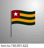 Togo waving Flag. Стоковая иллюстрация, агентство Ingram Publishing / Фотобанк Лори