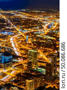 Sunset aerial view of Chicago Skylines building at Chicago downtown in Chicago City Illinois USA. Стоковое фото, агентство Ingram Publishing / Фотобанк Лори