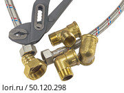 Разводной ключ, краны и фитинги на белом фоне. Diverter wrench, faucets and fittings on white background. Стоковое фото, фотограф Татьяна Д / Фотобанк Лори