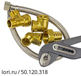 Разводной ключ, краны и фитинги на белом фоне. Diverter wrench, faucets and fittings on white background. Стоковое фото, фотограф Татьяна Д / Фотобанк Лори