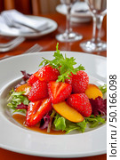 Fresh salad featuring vibrant strawberries, peaches, and mixed greens, elegantly presented in a white bowl, showcasing colorful ingredients and healthy eating lifestyle. Стоковое AI-изображение, AI-художник Ирина Ручушкина / Фотобанк Лори
