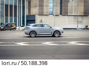 Changan UNI-K SUV car on the city road. Fast moving crossover on Moscow streets. Compliance with speed limits on the road. Редакционное фото, фотограф Константин Григорьев / Фотобанк Лори