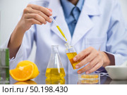 Biofuel research process in laboratory, Microalgae Photobioreactor for alternative energy innovation in Renewable Energy Laboratory. Стоковое фото, агентство Ingram Publishing / Фотобанк Лори