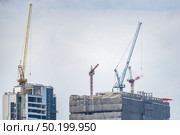 The construction site to build the business building,  condominium, and company. Стоковое фото, агентство Ingram Publishing / Фотобанк Лори