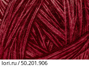 Deep red striped scratchy delicate wool yarn texture suitable as background concept. Стоковое фото, фотограф Camptoloma / Фотобанк Лори