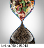 Composting recycling process as kitchen table scraps are transformed into organic soil in an hourglass with 3D illustration elements. Стоковое фото, агентство Ingram Publishing / Фотобанк Лори