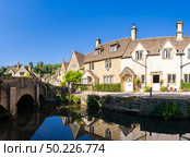 Castle Combe village in Cotswolds England UK. Стоковое фото, агентство Ingram Publishing / Фотобанк Лори
