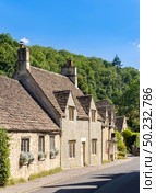 Castle Combe village in Cotswolds England UK. Стоковое фото, агентство Ingram Publishing / Фотобанк Лори