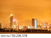 Shenzhen, Shenzhen Bay Park sunset scenery, skyline building city. Стоковое фото, агентство Ingram Publishing / Фотобанк Лори