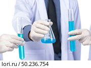 scientist with equipment and science experiments ,laboratory glassware containing chemical liquid for design or decorate science or other your content and selective focus. Стоковое фото, агентство Ingram Publishing / Фотобанк Лори