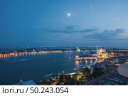 Panoramic view of traditional old Gondola on Canal Grande with historic San Giorgio Maggiore church on background in beautiful golden evening light at sunset in summer, San Marco, Venice, Italy.. Beautiful sunset in Venice. Стоковое фото, агентство Ingram Publishing / Фотобанк Лори