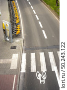 BRUSSELS, BELGIUM - February 24, 2014:City Bike docking station in Brussels. Villo Bike is a privately owned for-profit public bicycle sharing system that serves in Brussels. City Bike docking station. Редакционное фото, агентство Ingram Publishing / Фотобанк Лори