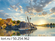 Cloudy sunset on river Nile in Aswan, Egypt. Стоковое фото, агентство Ingram Publishing / Фотобанк Лори