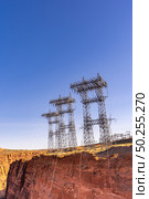 Power plant house and power line over Electricity generating dam in Page Arizona USA. Стоковое фото, агентство Ingram Publishing / Фотобанк Лори