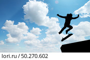 Skater jump silhouette and blue sky. Element of design. Стоковое фото, агентство Ingram Publishing / Фотобанк Лори