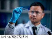 Scientists are inventing chemicals for medical use. Стоковое фото, агентство Ingram Publishing / Фотобанк Лори