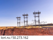 Power plant house and power line over Electricity generating dam in Page Arizona USA. Стоковое фото, агентство Ingram Publishing / Фотобанк Лори