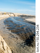 Sediment transposition intervention to the Atlantic Ocean to optimize the hydrodynamic balance in Ovar, Portugal. Стоковое фото, агентство Ingram Publishing / Фотобанк Лори
