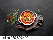 Cooking pasta e fagioli soup with chicken meat and vegetables, italian cuisine. Стоковое фото, агентство Ingram Publishing / Фотобанк Лори