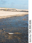 Sediment transposition intervention to the Atlantic Ocean to optimize the hydrodynamic balance in Ovar, Portugal. Стоковое фото, агентство Ingram Publishing / Фотобанк Лори