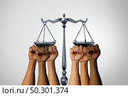 Revolution Justice and legal activism with a group of activist protesters demonstrating for social laws to fight unrest with 3D illustration elements. Стоковое фото, агентство Ingram Publishing / Фотобанк Лори