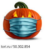 Halloween face mask as a jack o lantern pumpkin wearing a medical face mask as an autumn symbol for disease control and virus infection and coronavirus or covid-19 safety in a 3D illustration style. Стоковое фото, агентство Ingram Publishing / Фотобанк Лори