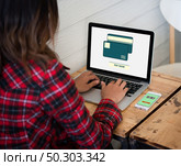 Online purchase credit card on laptop screen with woman hands typing. Стоковое фото, агентство Ingram Publishing / Фотобанк Лори