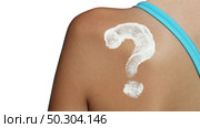 Sun screen and sunscreen idea or sunblock and skin cancer protection as protective cream shaped as a question mark to prevent sunburn. Стоковое фото, агентство Ingram Publishing / Фотобанк Лори