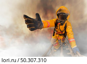 Firefighters rescued the survivors. Стоковое фото, агентство Ingram Publishing / Фотобанк Лори