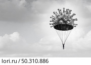 After the pandemic and business recovery or the economy recovering from the coronavirus or covid-19 disease or illness as a businessman or citizen in a soft landing virus parachute with 3D illustration elements. Стоковое фото, агентство Ingram Publishing / Фотобанк Лори