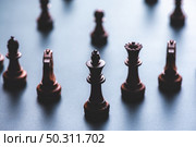 Chess pieces board game in business success leadership concept. Стоковое фото, агентство Ingram Publishing / Фотобанк Лори