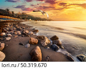 Mediterranean sea and mountains in turkish Kemer. Stones by the sea. Стоковое фото, агентство Ingram Publishing / Фотобанк Лори