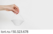 close up hand holding mask. Стоковое фото, агентство Ingram Publishing / Фотобанк Лори