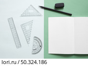 elevated view geometric equipment notebook pencil eraser dual colorful background. Стоковое фото, агентство Ingram Publishing / Фотобанк Лори