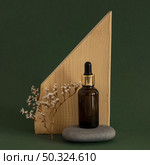 front view skin product dropper arrangement. Стоковое фото, агентство Ingram Publishing / Фотобанк Лори