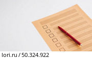 high angle uncompleted voting questionnaire. Стоковое фото, агентство Ingram Publishing / Фотобанк Лори