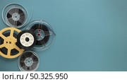 top view movie reels with copy space. Resolution and high quality beautiful photo. top view movie reels with copy space. High quality beautiful photo concept. Стоковое фото, агентство Ingram Publishing / Фотобанк Лори