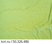 close up green crumpled paper background. Resolution and high quality beautiful photo. close up green crumpled paper background. High quality beautiful photo concept. Стоковое фото, агентство Ingram Publishing / Фотобанк Лори
