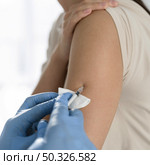 coronavirus vaccine woman s arm. Resolution and high quality beautiful photo. coronavirus vaccine woman s arm. High quality beautiful photo concept. Стоковое фото, агентство Ingram Publishing / Фотобанк Лори